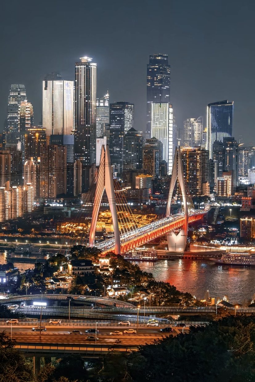 Chongqing night skyline with the Dongshuimen Bridge over the Yangtze River