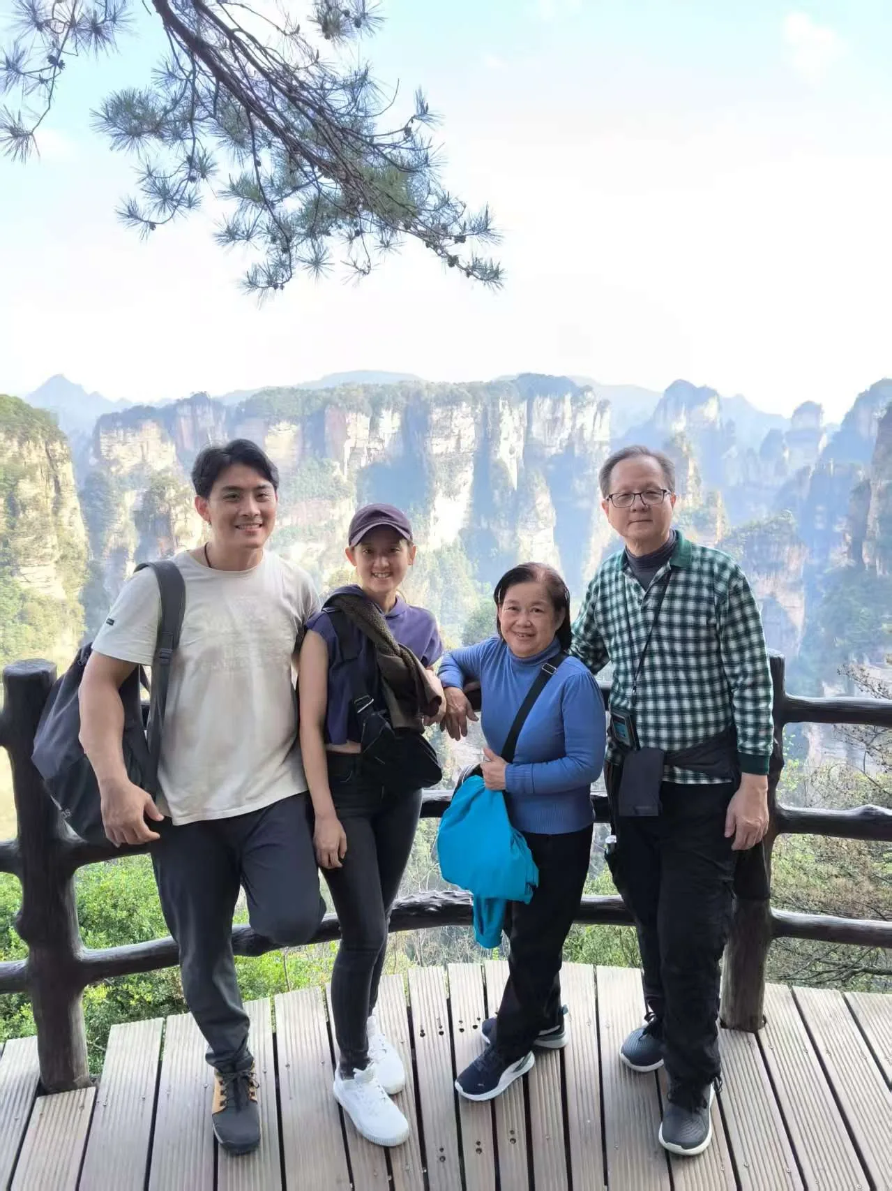 Family of four at a Wulingyuan viewpoint, Zhangjiajie National Forest Park