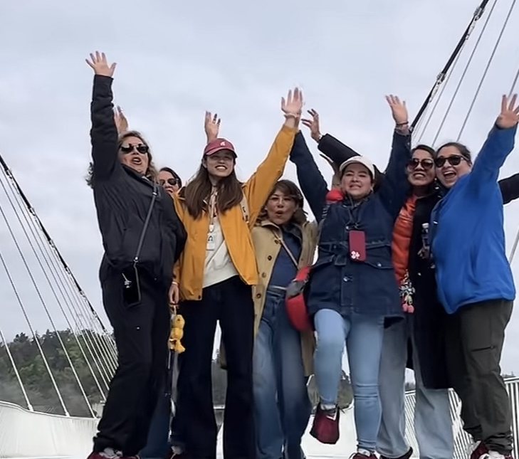 Yu, our English-speaking private tour guide, with guests on a Zhangjiajie private tour