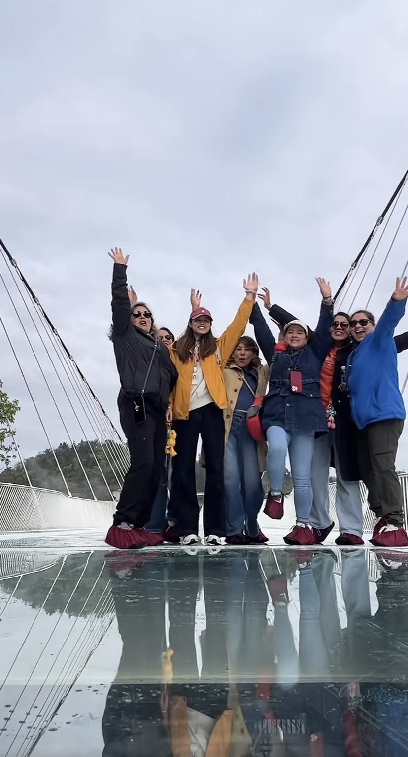 Guests celebrating on the Zhangjiajie Grand Canyon glass bridge