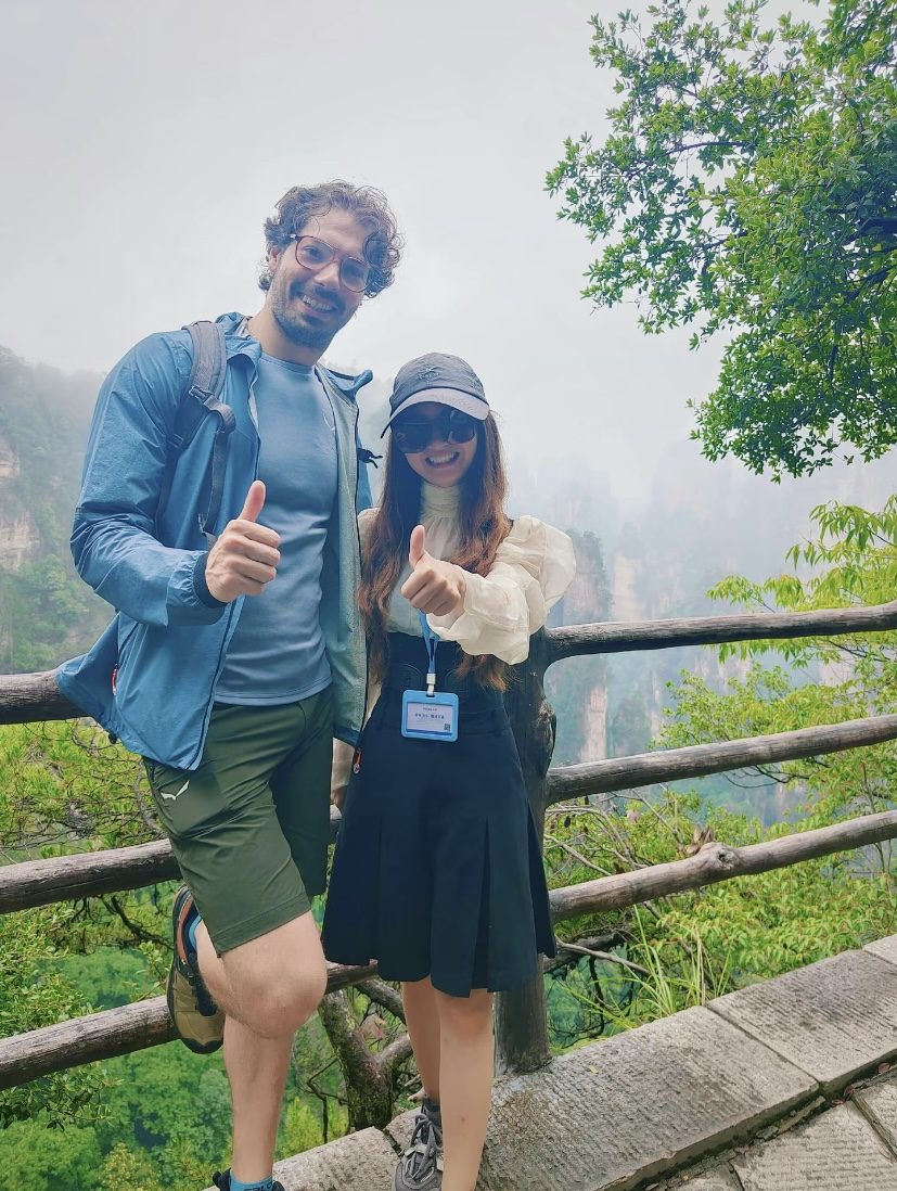 A China Fantasy Travel local guide with a happy guest in Zhangjiajie