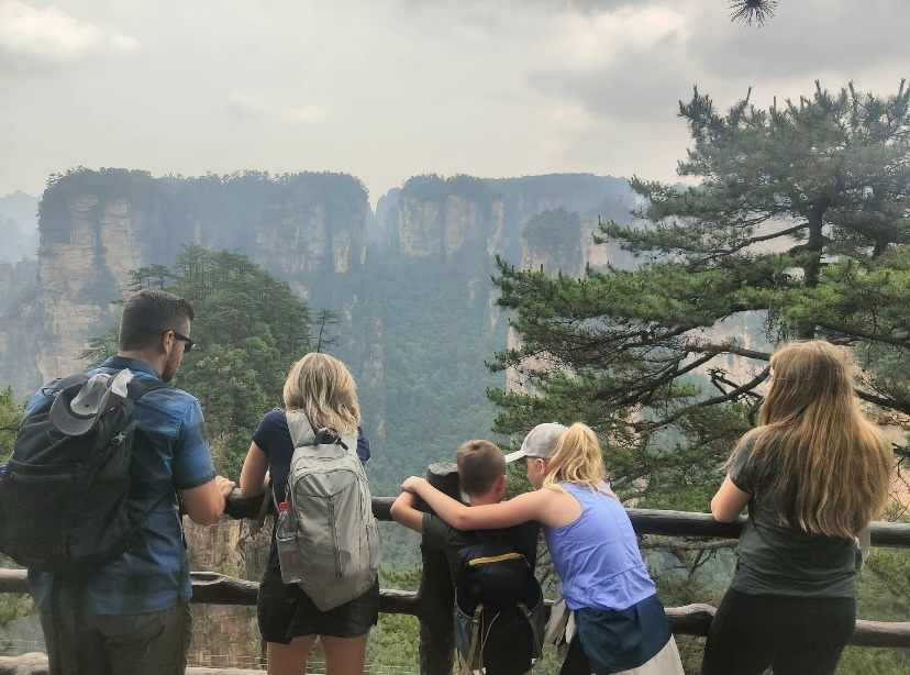 A family at a Zhangjiajie Avatar mountains viewpoint on a private tour